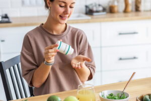 a girl taking the pill
